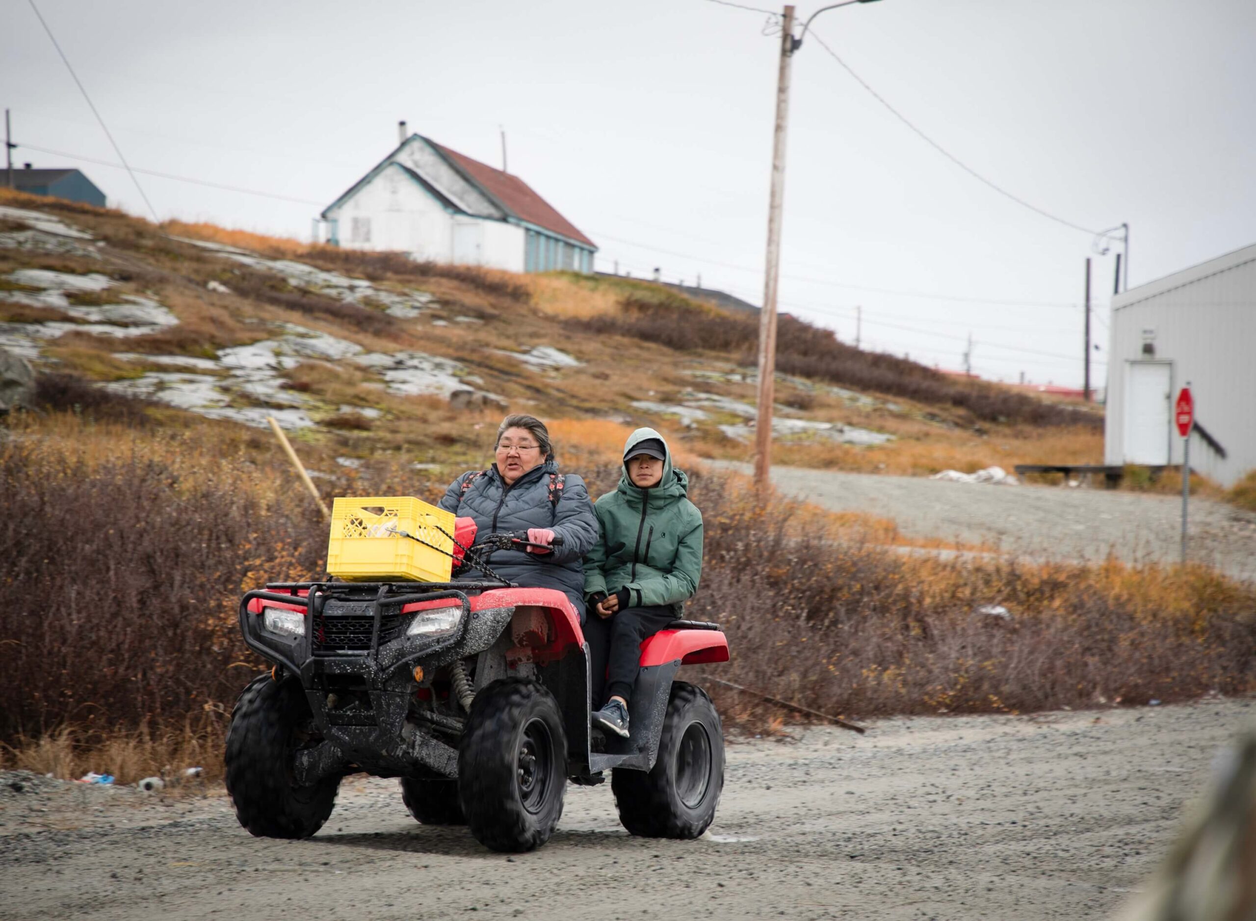 Community members travel throughout Inukjuak by ATV, one of the most common means of transportation in northern communities.