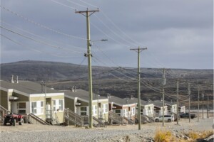 Homes and power lines in Inukjuak, northern Quebec, October 2024. The Inuit community has successfully replaced diesel power with clean hydroelectricity in most homes and buildings through a new grid installed by the community-led Innavik Hydro project, which has been operational since November 2024.